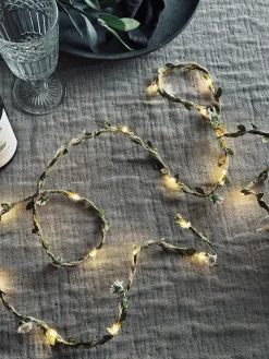 Lyskæde med blade og blomster