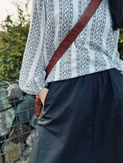 Nederdel A-formet med lommer