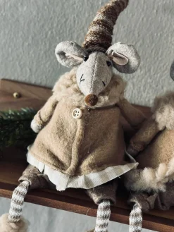 Nissemus - Siddende Pige