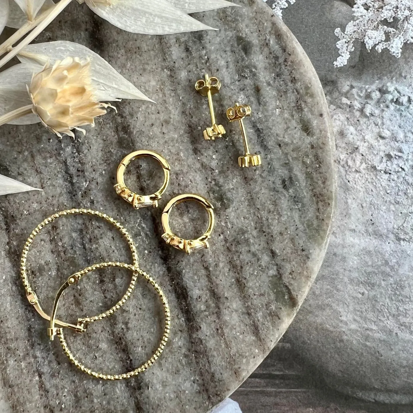 Ørestikker GIA - Klar sten 18K forgyldt