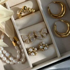 Ørestikker Noor forgyldt