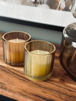 Stearinlys i farvet glas